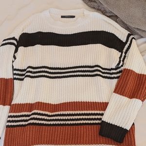 Striped sweater, rust, cream, black.
